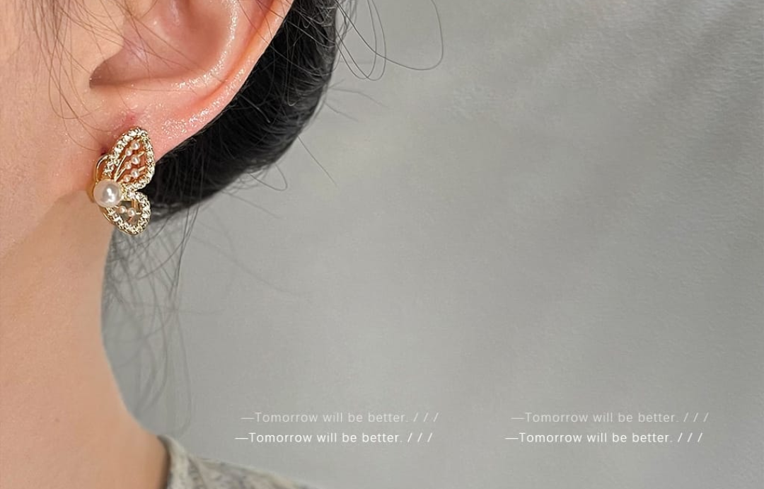 Elegant Pearl Butterfly Stud Earrings