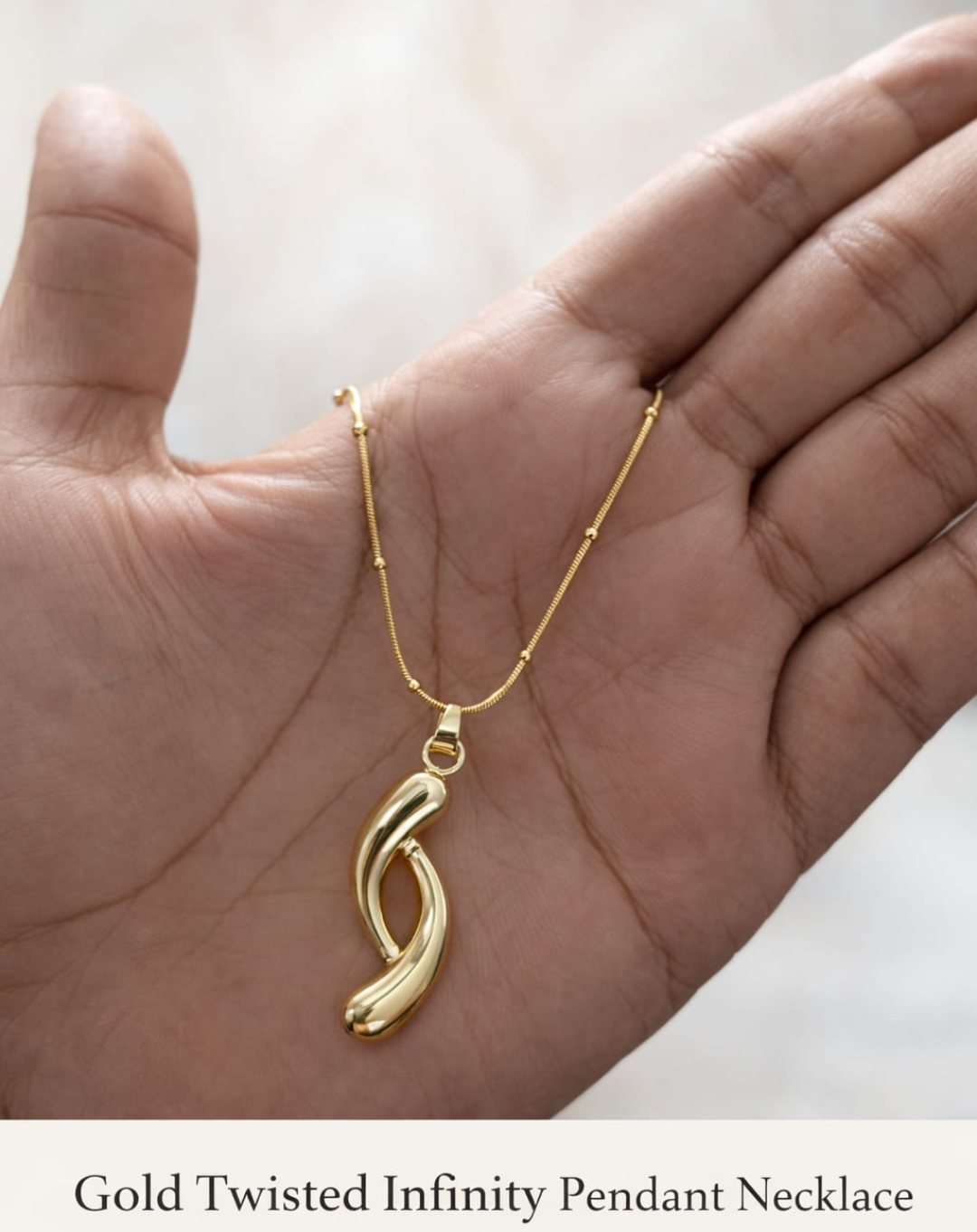 Gold Twisted Infinity Pendant Necklace