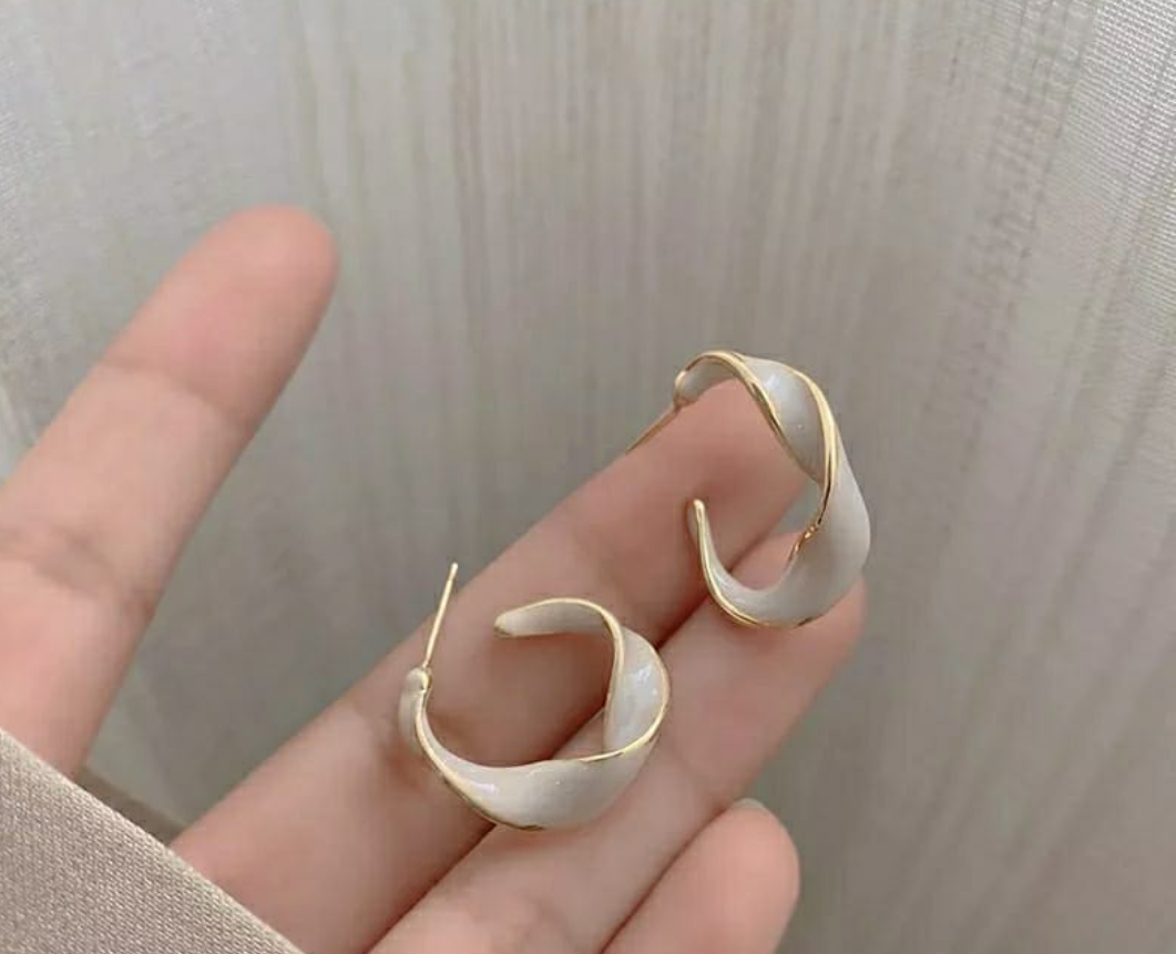 The Aurora Twist Hoop Earrings