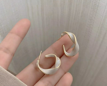 The Aurora Twist Hoop Earrings