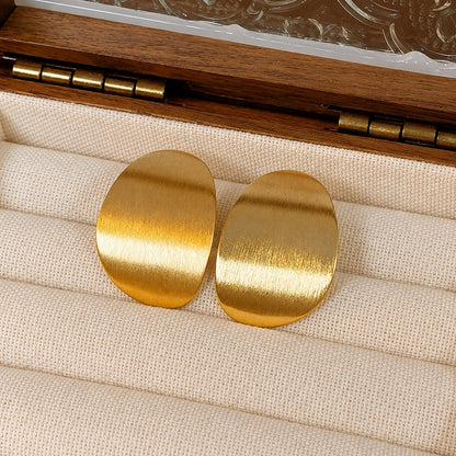Golden Textured Statement Earrings