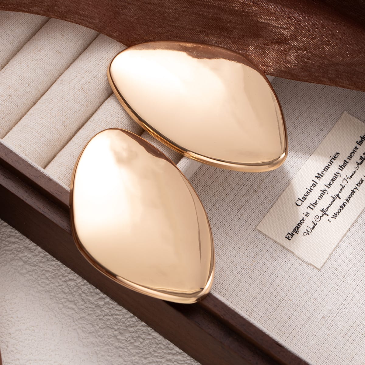 Golden Sculptural Statement Earrings