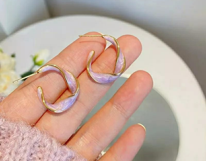 The Aurora Twist Hoop Earrings