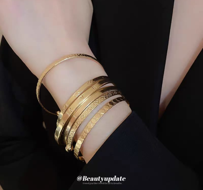 Layered Gold Bangle Stack Set