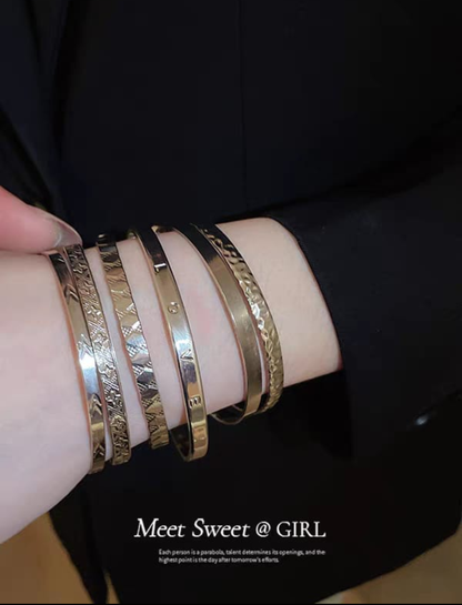 Layered Gold Bangle Stack Set