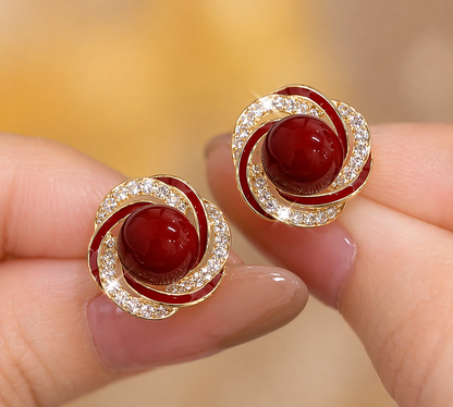 Gold Swirl Red Stone Stud Earrings