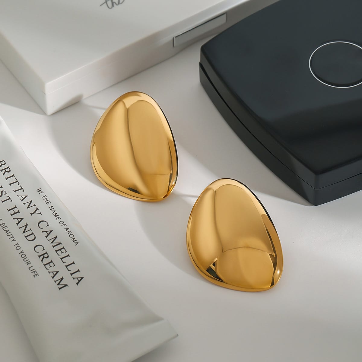 Golden Sculptural Statement Earrings