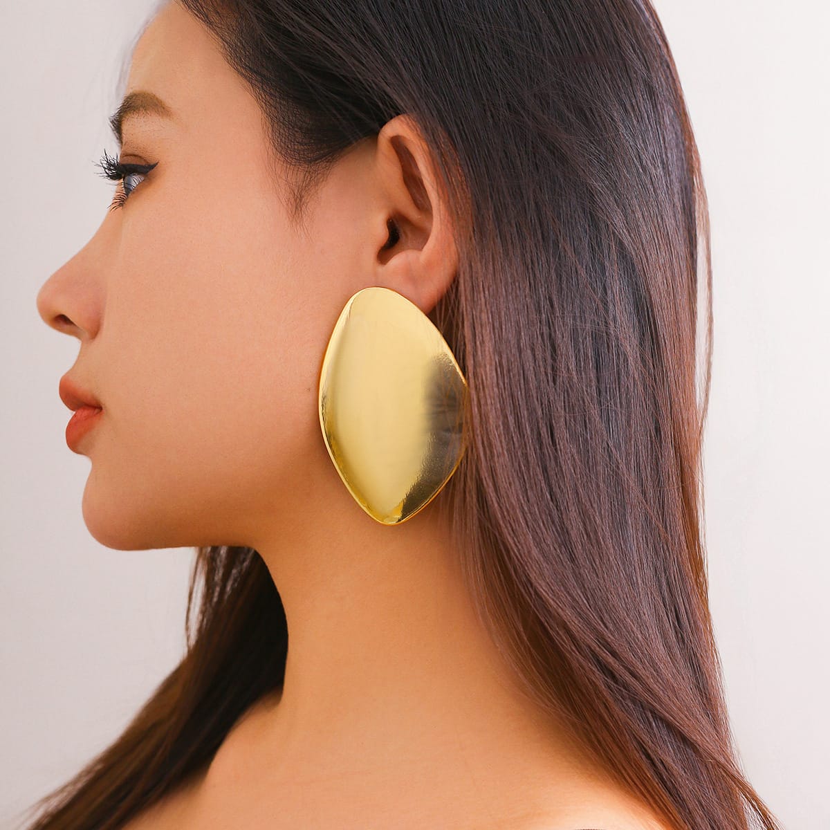 Golden Sculptural Statement Earrings