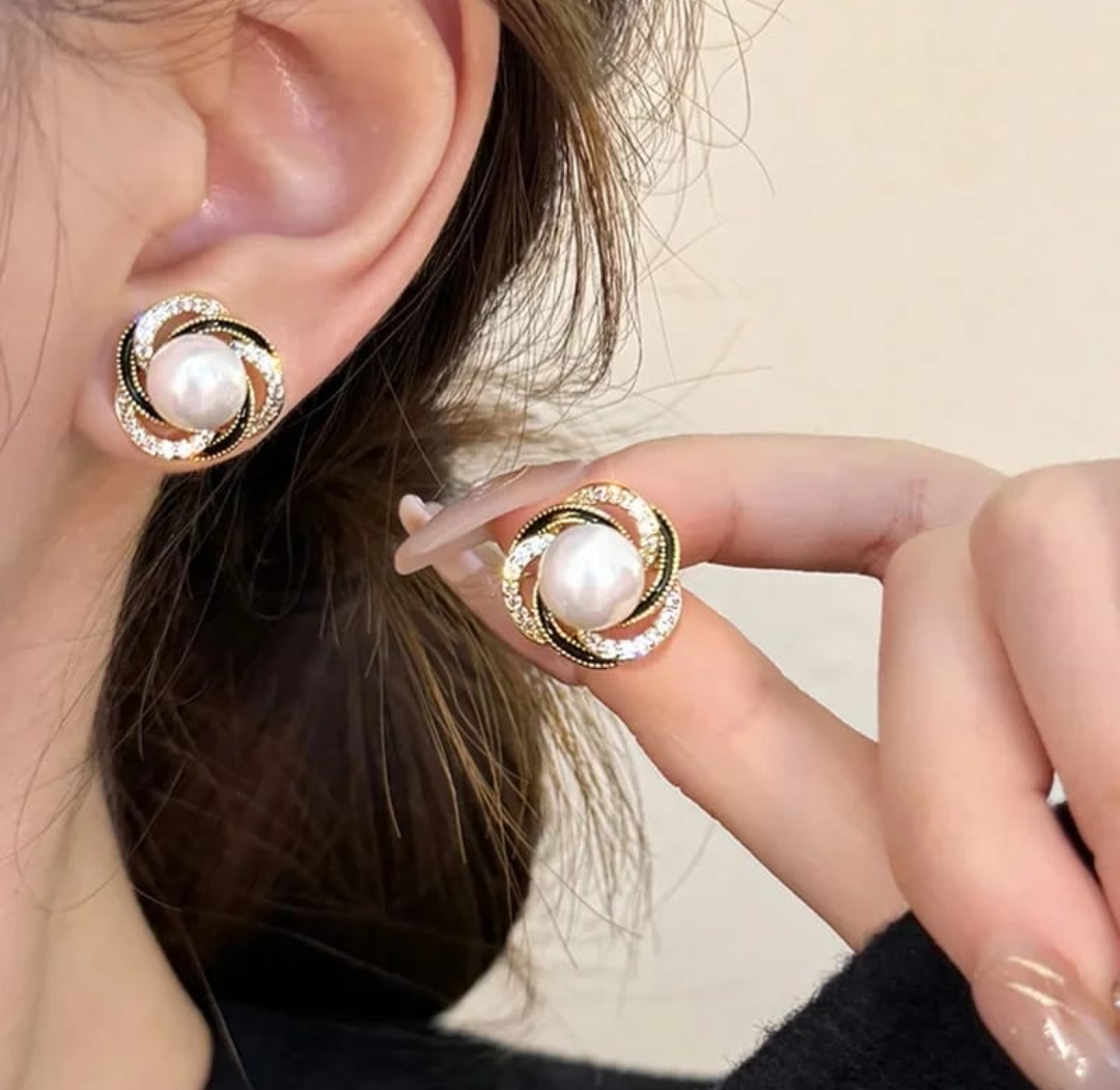 Gold Swirl Red Stone Stud Earrings