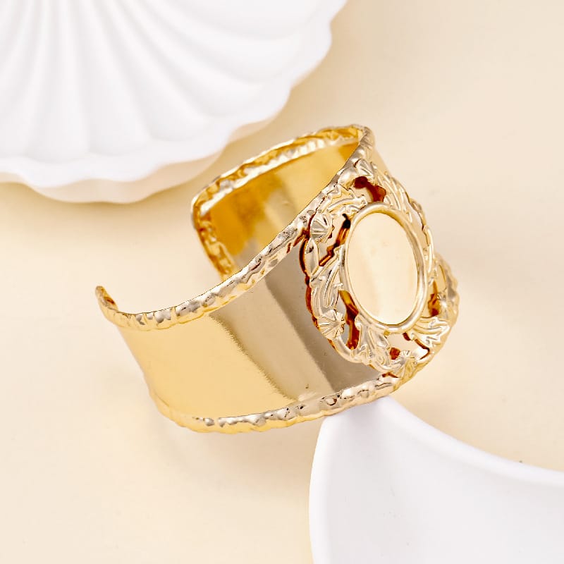 Elegant Gold-Tone Floral Cuff Bracelet with Round Center Design