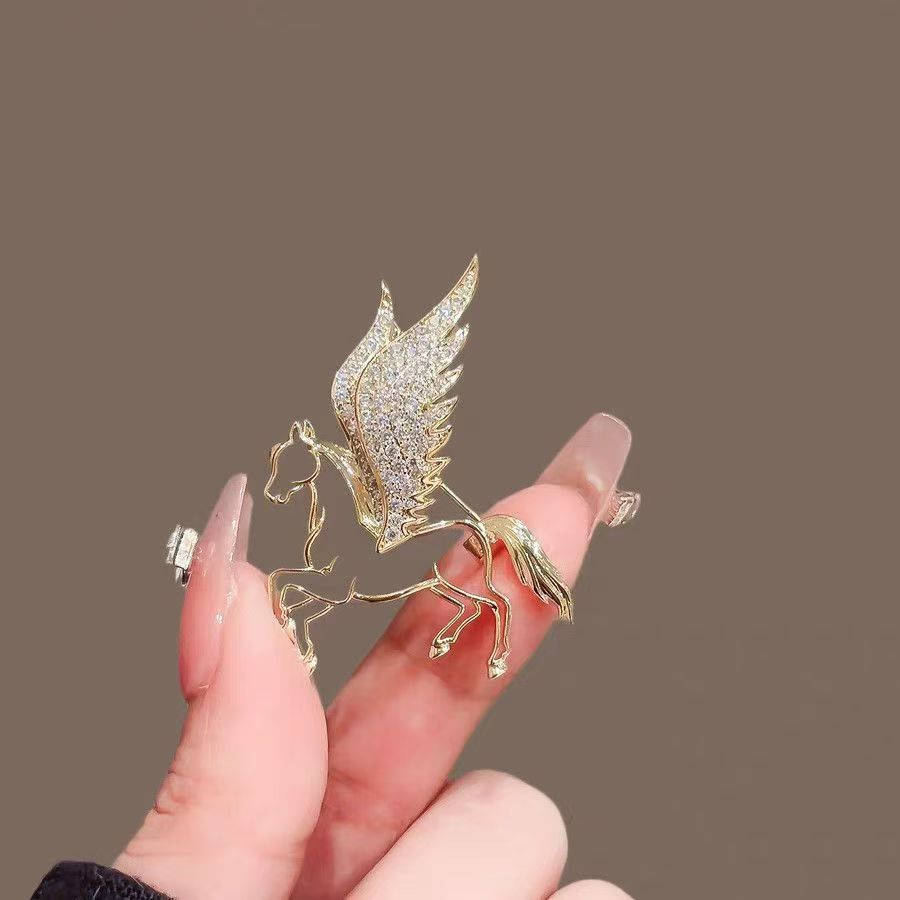 Gold-Tone Crystal Pegasus Brooch – Winged Horse Statement Lapel Pin