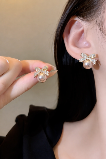 Elegant Crystal Bow Pearl Stud Earrings