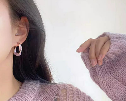 The Aurora Twist Hoop Earrings