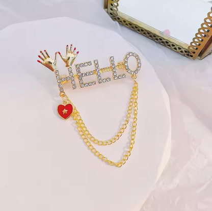 Crystal “HELLO” Letter Brooch with Chain Tassel