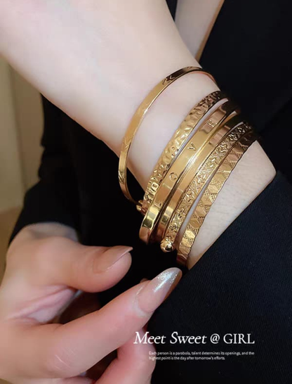 Layered Gold Bangle Stack Set