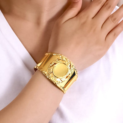 Elegant Gold-Tone Floral Cuff Bracelet with Round Center Design