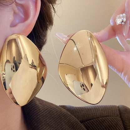 Golden Sculptural Statement Earrings